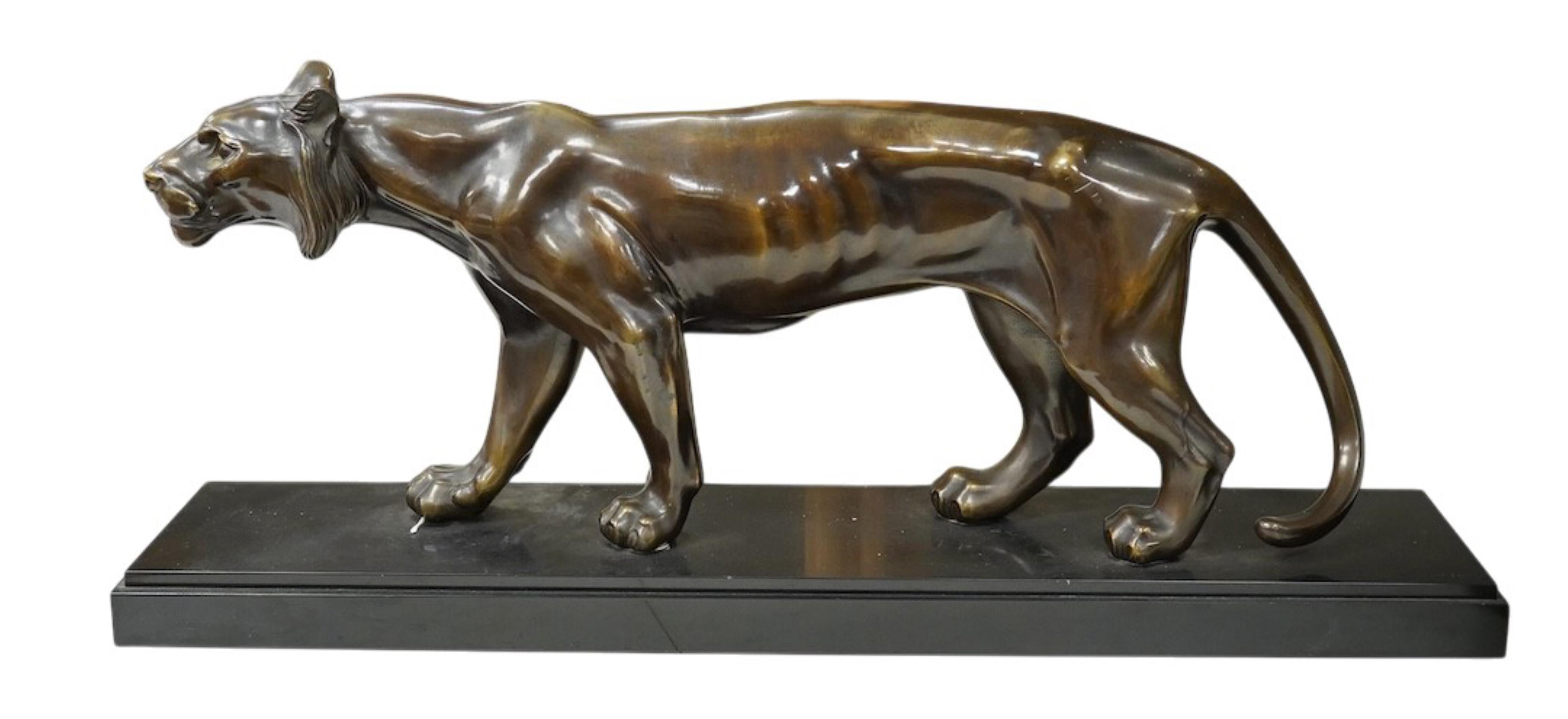 Manner of Maurice Font (19th/20th century): An Art Deco style bronzed spelter model of a tiger